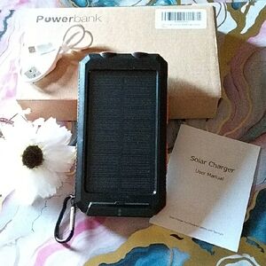 Black Solar Powerbank Charger BRAND NEW in Box.